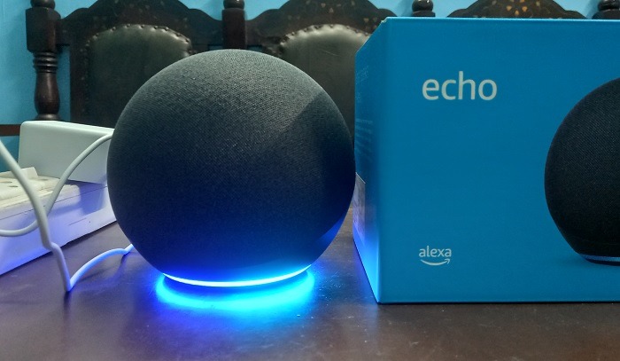 Amazon Echo blue lights on in listening mode.