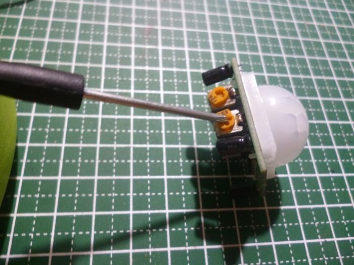 Screwdriver Turning Raspberry Pi Motion Sensor Screw For Adjustment