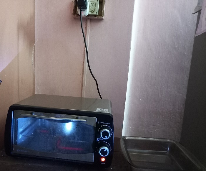 Oven connected to smart plug and timer turned on for the device.