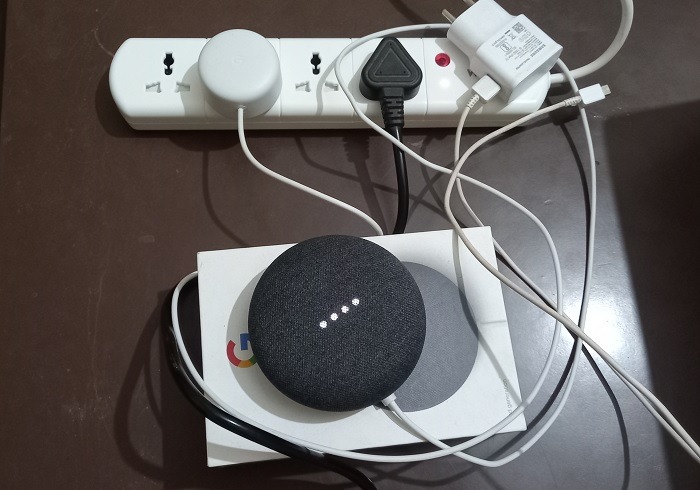 Nest Mini connected to a smart power strip. 