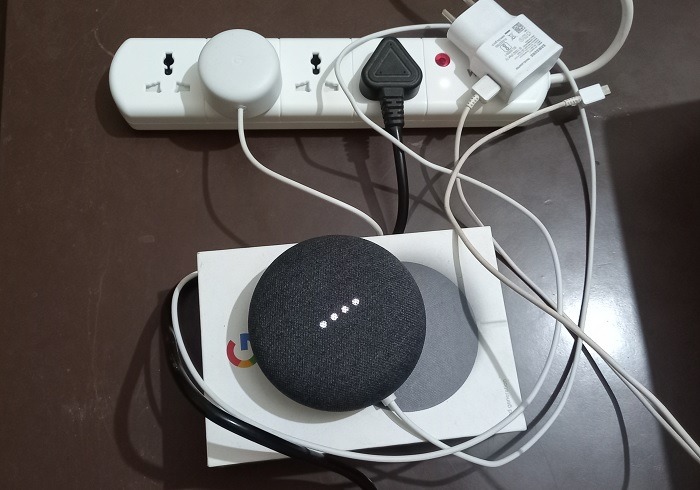 Nest Mini connected to a smart power strip.
